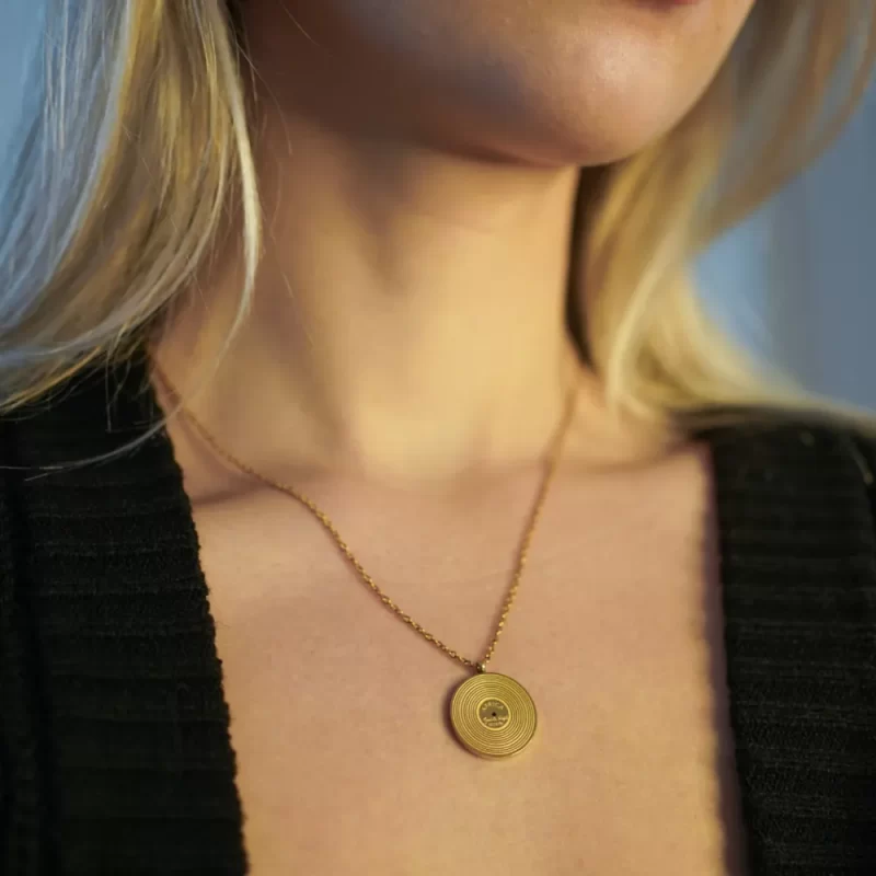 gold Adele Someone Like You lyric necklace worn by woman showing pendant size and fit